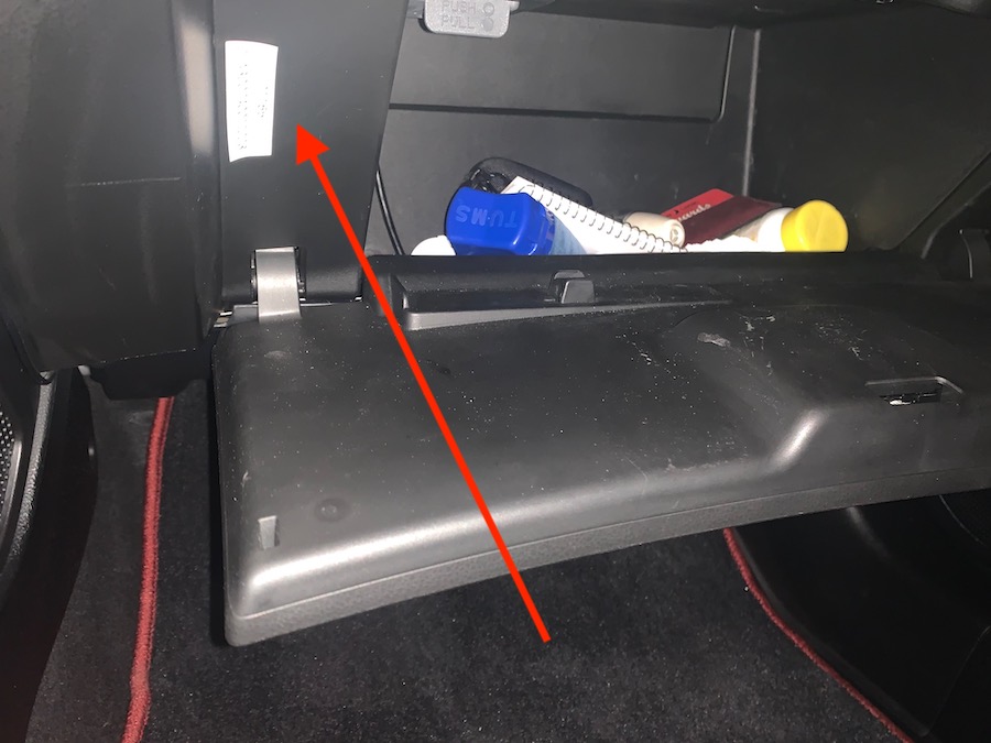 Radio code in glove compartment